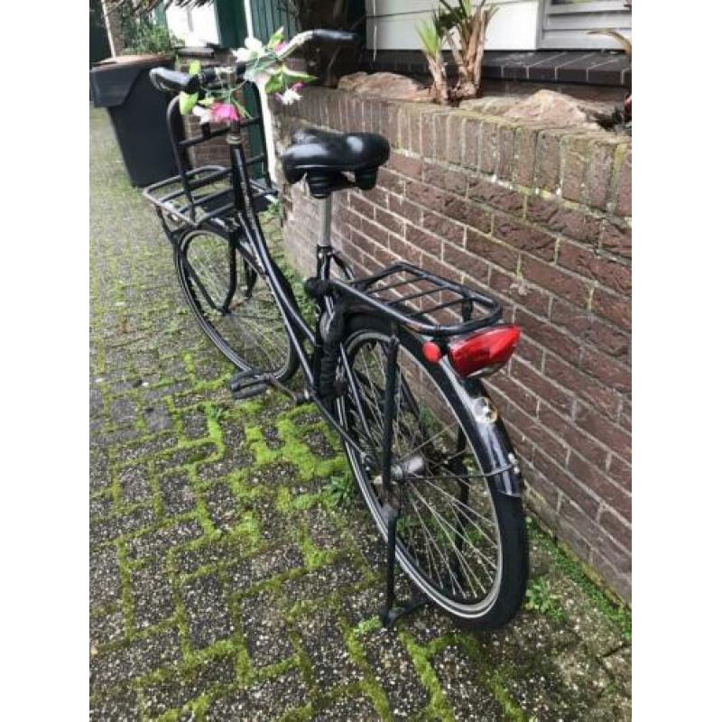 Omafiets met verlichting en slot