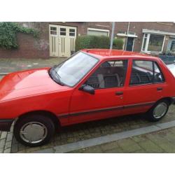 Peugeot 205,1991 Rood. Misschien wel Jouw nieuwe auto?