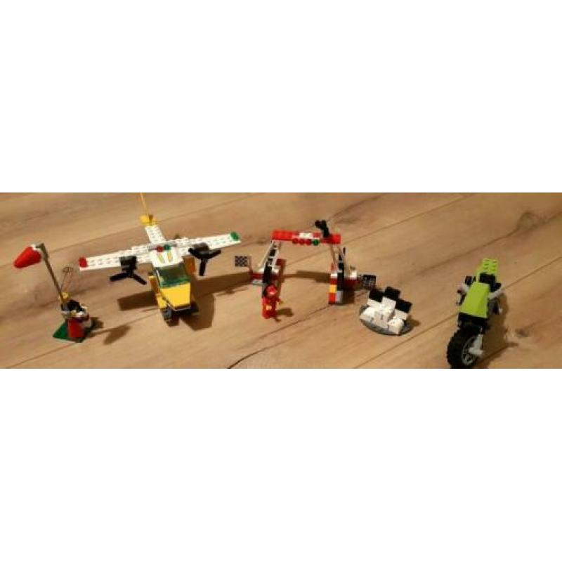 Super Veel Lego: 3 legosets; racecircuit,motor, en luchtbaan