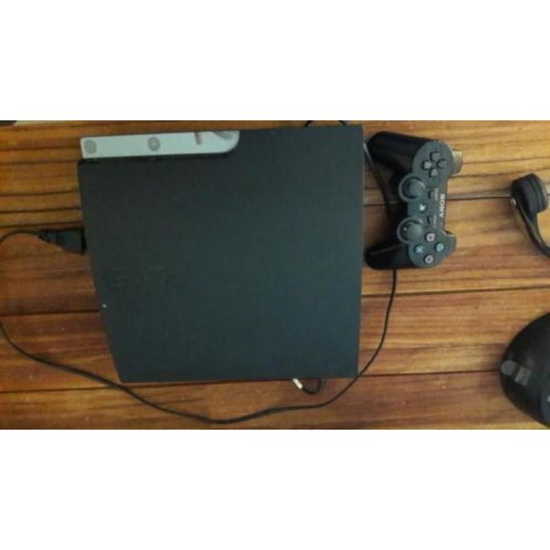 playstation3 +1controler ,headset en knuppel