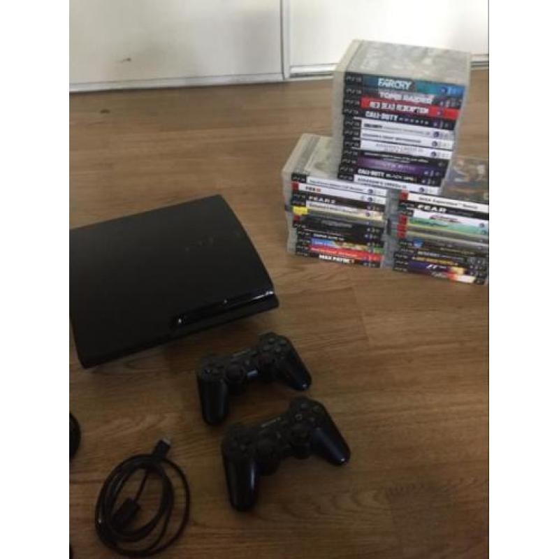 PlayStation 3 met 2 controllers en 33 games!