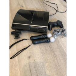 PS3 met 2 controllers , 2 motion controllers, cam ,38 games